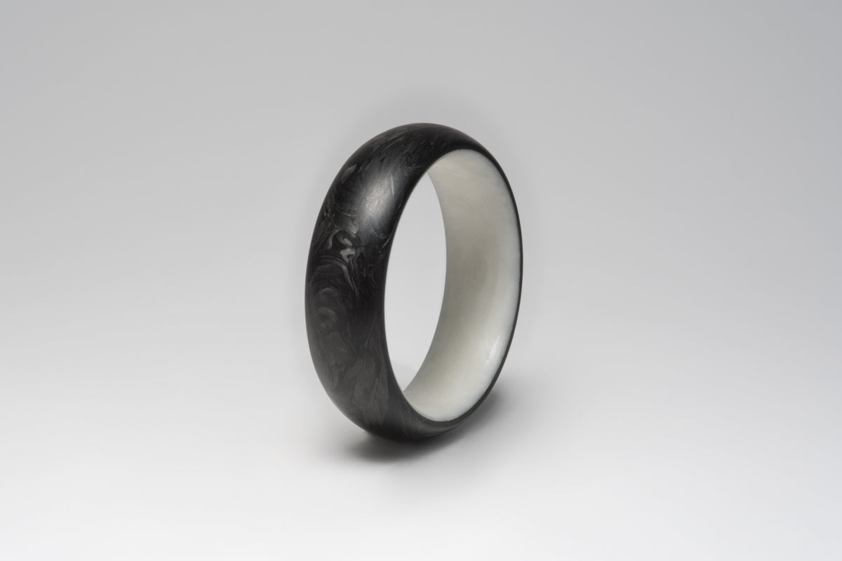 Bamboo silk and forged carbon fiber mens wedding band, three-quarter view