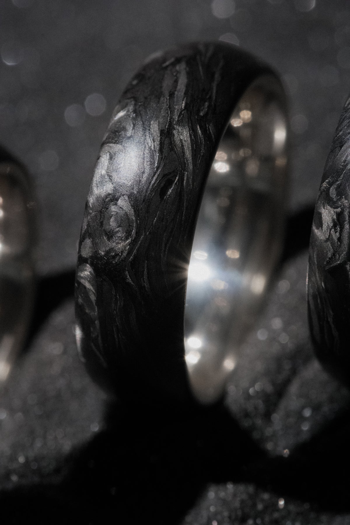 Close-up of the forged carbon fiber pattern and sterling silver interior